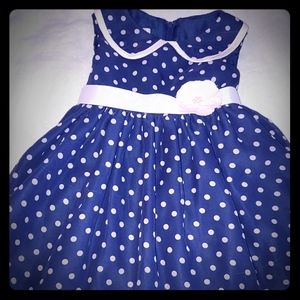 Sleeveless sheer polka dot dress with flower